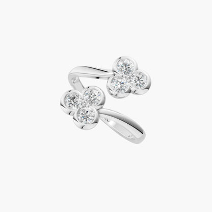 Silver ring with diamond accents on a white background