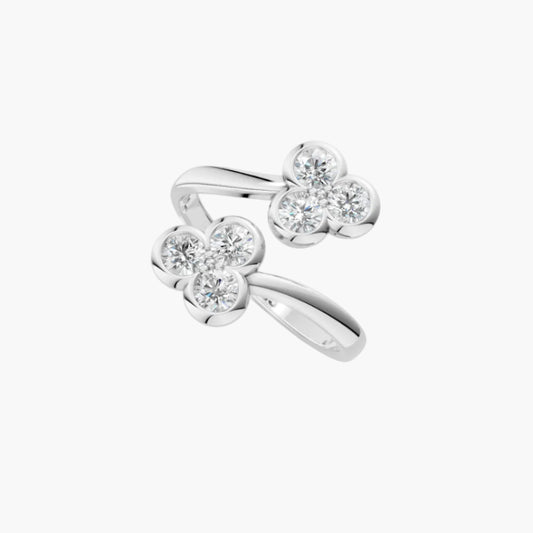 Silver ring with diamond accents on a white background